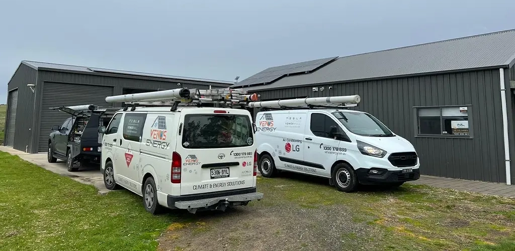 Energy-efficient home in Adelaide featuring solar panels, air conditioning units, and professional electrical installation by Venus Energy.