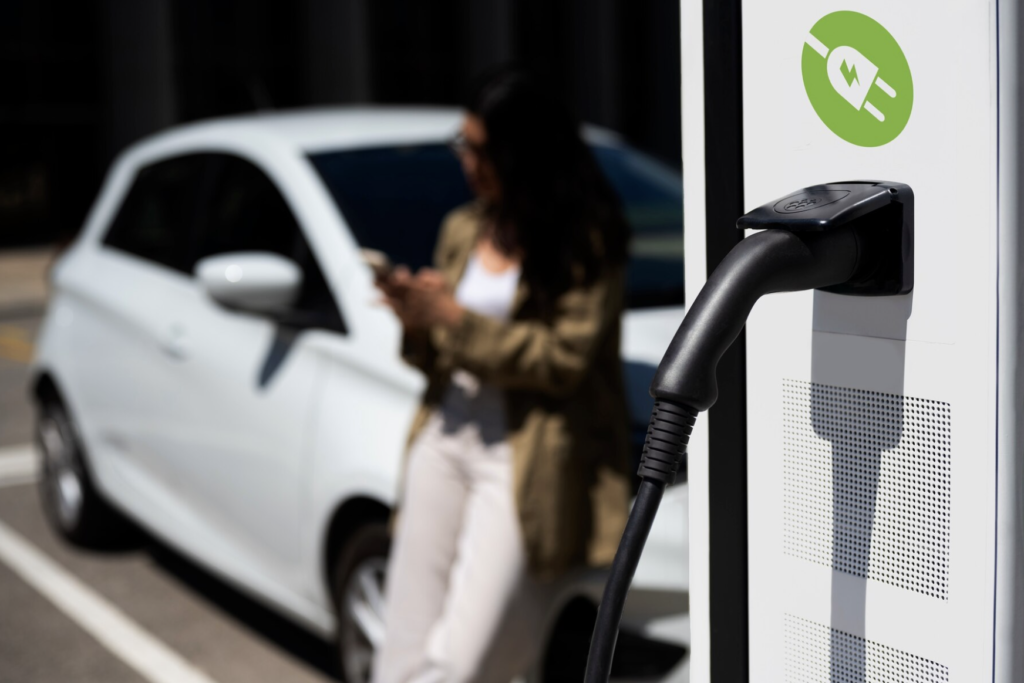 Commercial EV charger installation at a charging station for electric vehicles.